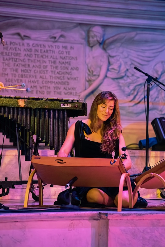 Simona Asinovski performing on the hammered dulcimer