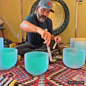 Sound bath instructor with singing bowls