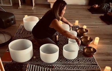 Sound bath practitioner with bowls